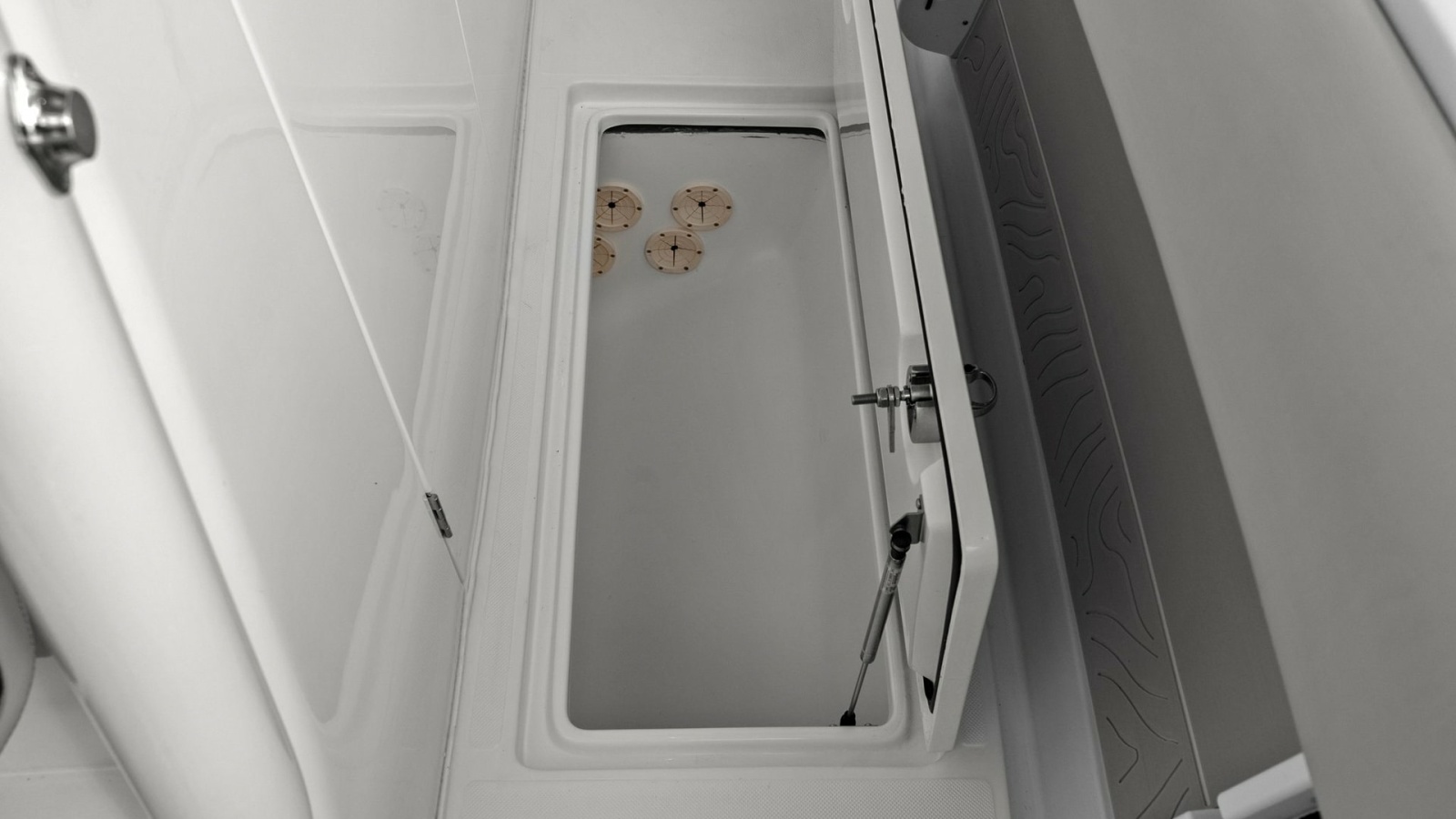 Spacious In-Deck Storage Compartment