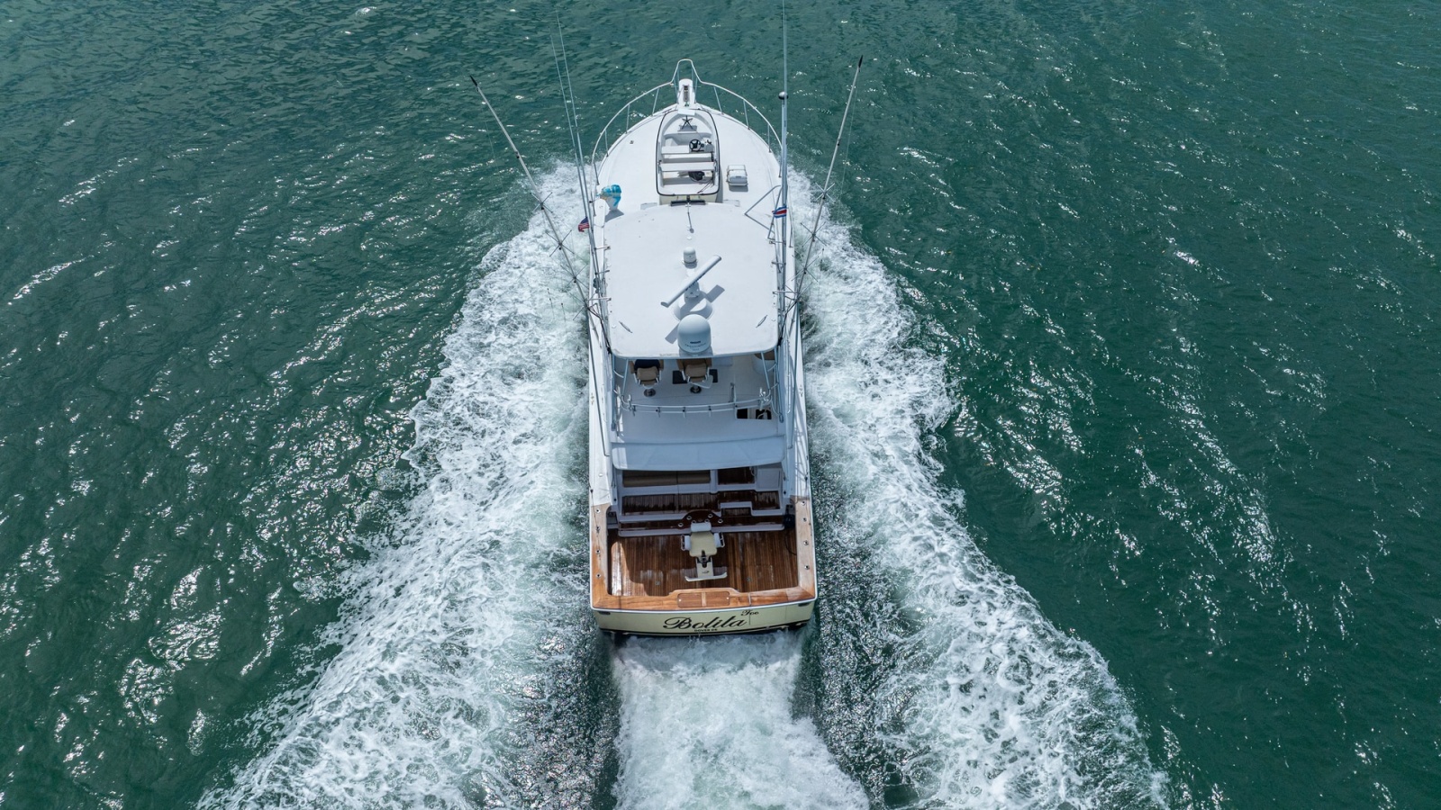Aerial View of Stern in Motion 2002 Viking 61 Convertible