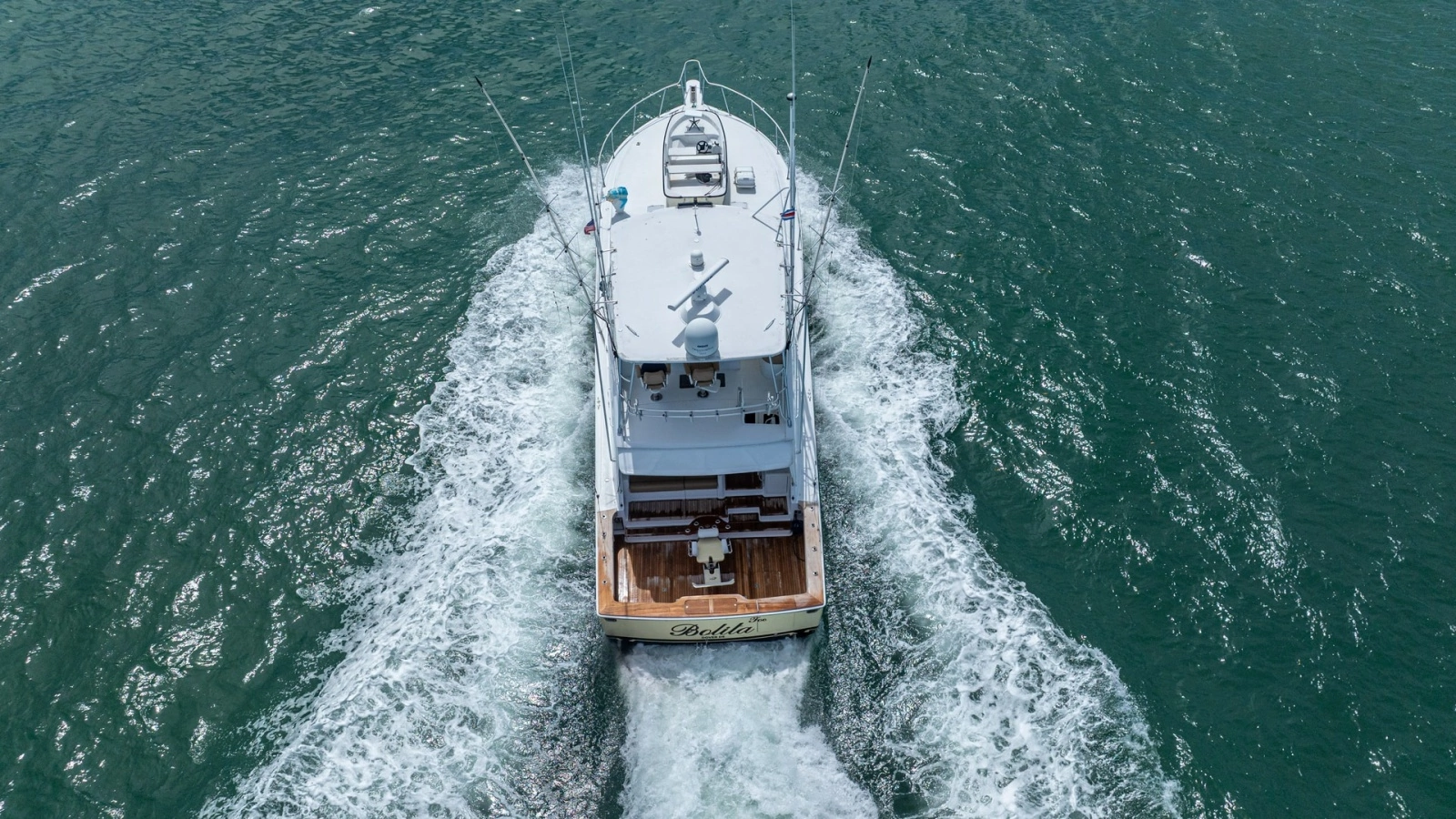 Aerial View of Stern in Motion 2002 Viking 61 Convertible