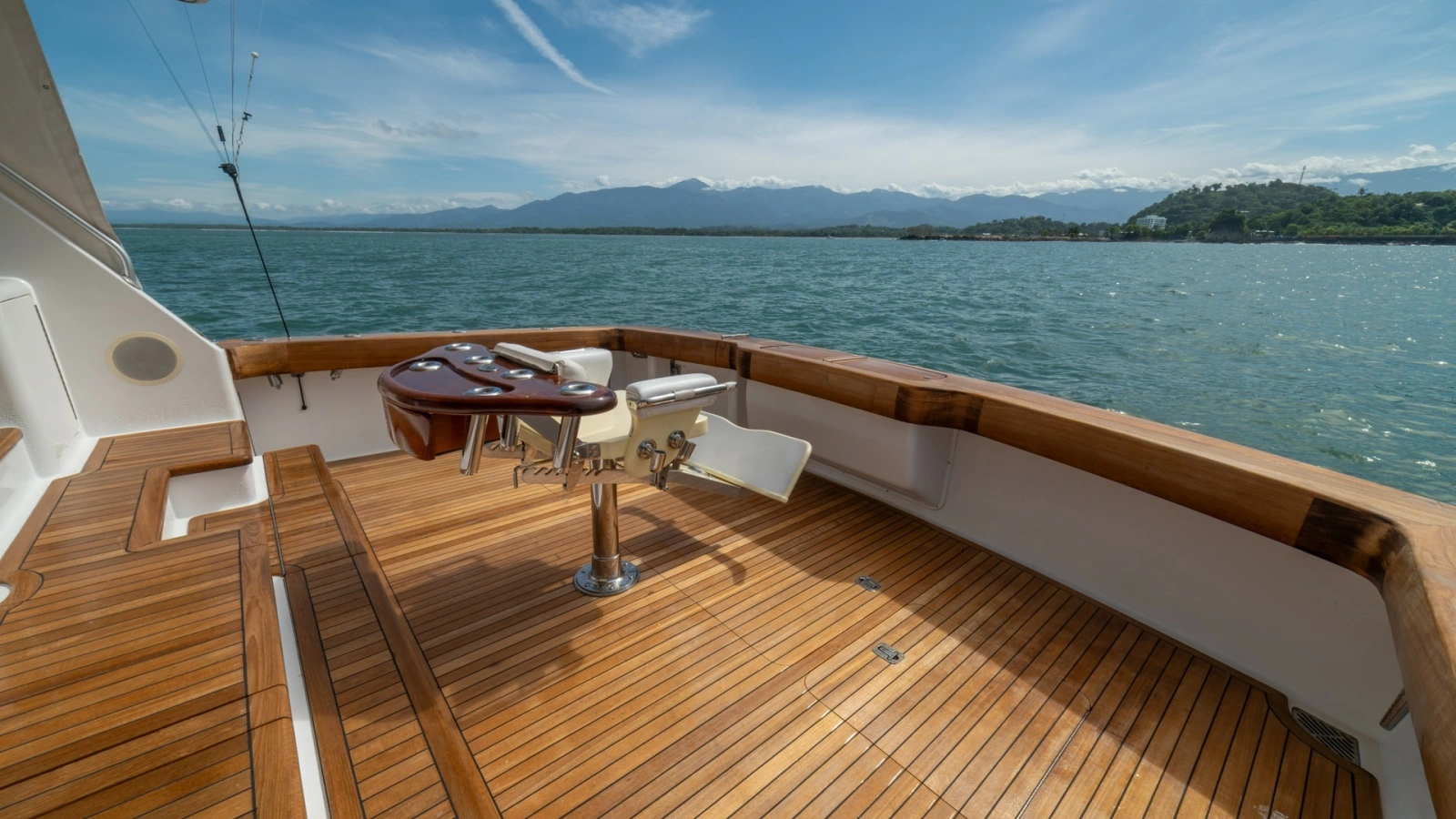 Spacious Teak Cockpit with Rod Holders 2002 Viking 61 Convertible