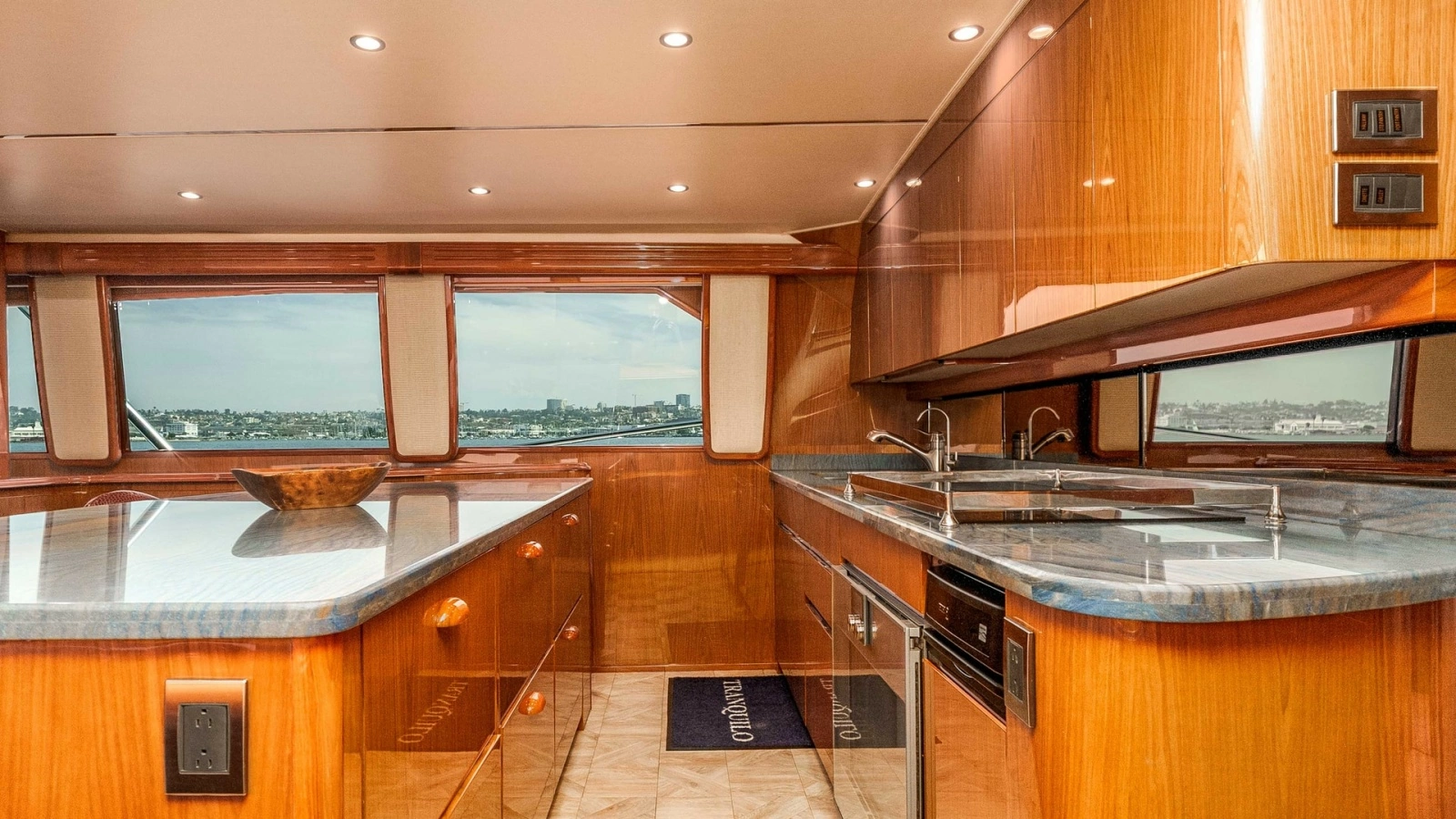 2014 Viking 76 Enclosed Bridge "TRANQUILO" Exudes Elegance with its High-Gloss Wooden Cabinetry and Sleek Countertops