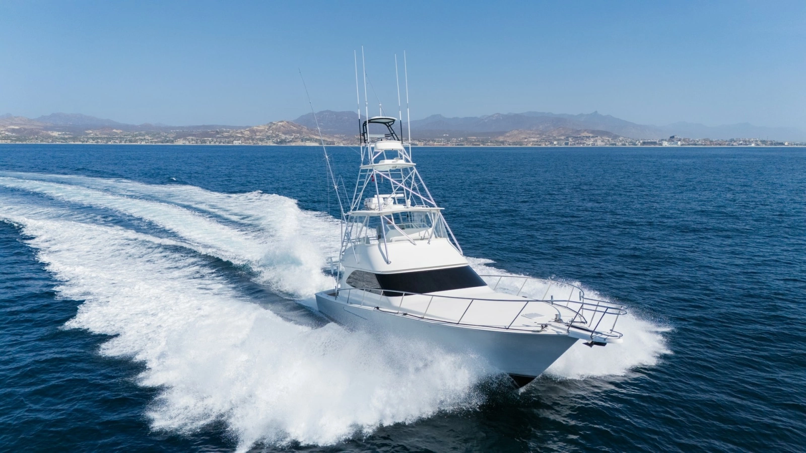 2009 Viking 50 Convertible "Jammin" - Starboard Bow View Highlighting the Yacht's Graceful Profile and On-Water Presence.