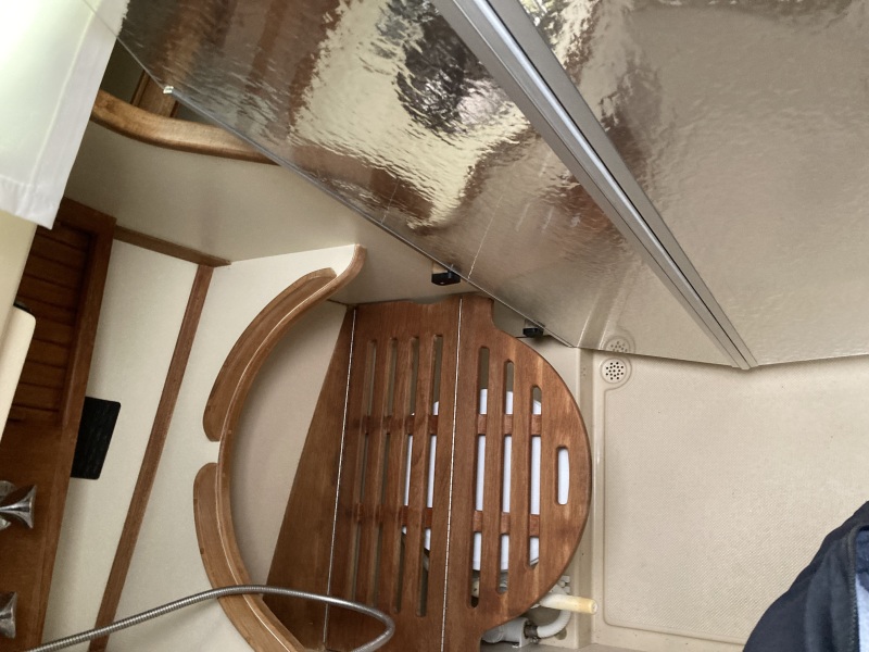 Shower seat down