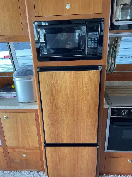 Refrigerator and freezer with Microwave