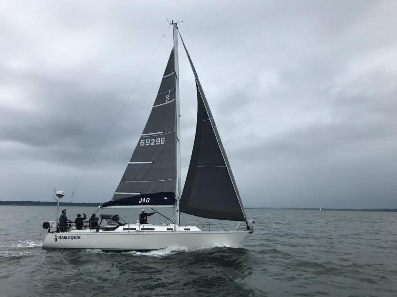 Harlequin under sail.