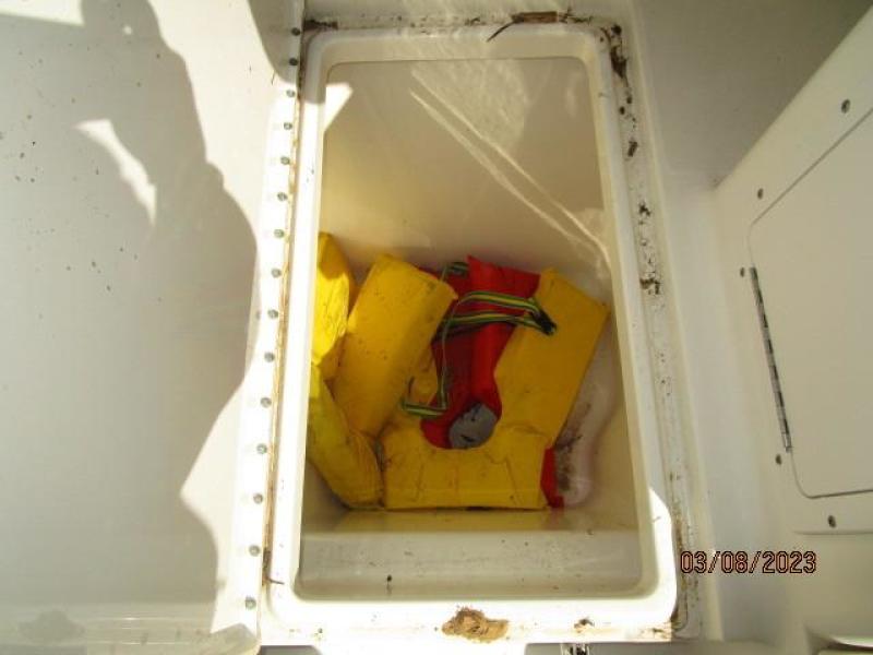25' Triton helm under-deck storage