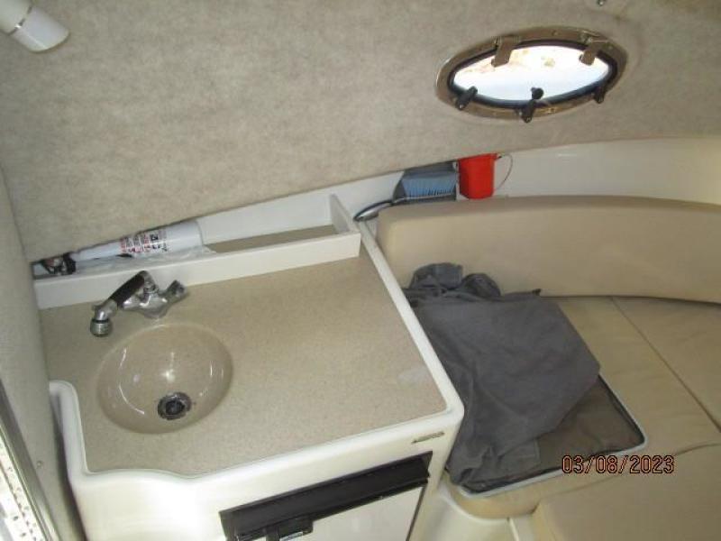 25' Triton cabin port