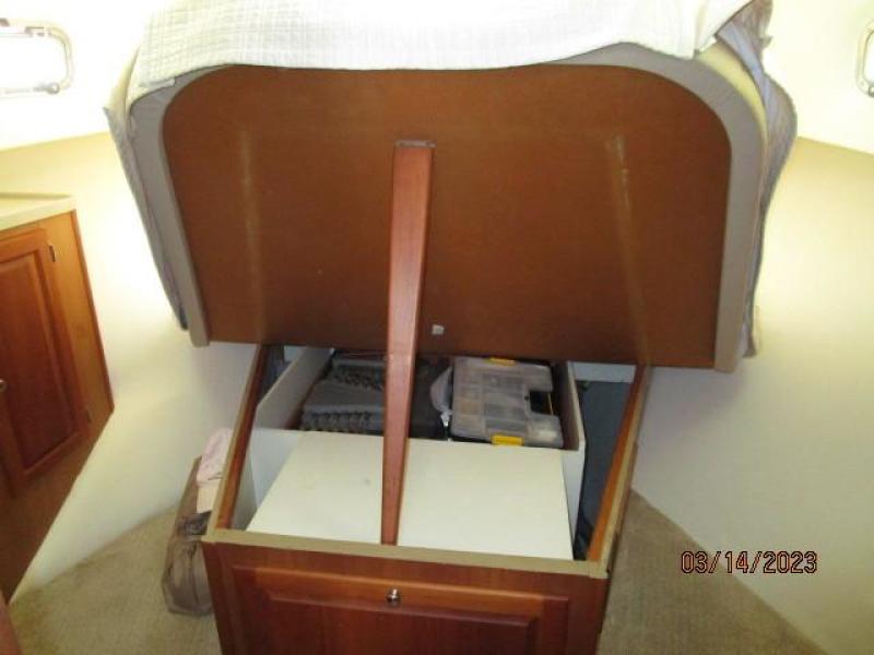 40' Mainship master stateroom berth storage