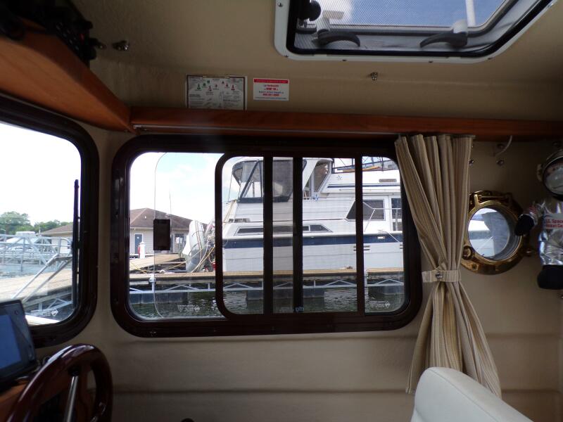 Miss Baker 2017 Ranger Tugs R-21EC window port