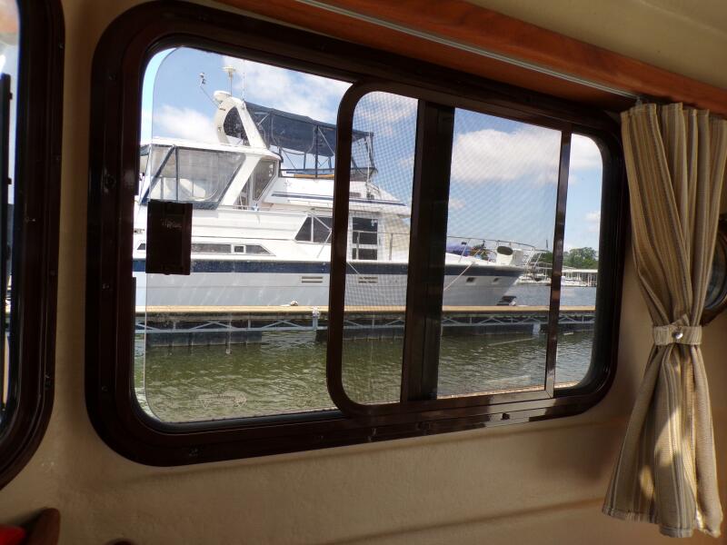 Miss Baker 2017 Ranger Tugs R-21EC window open
