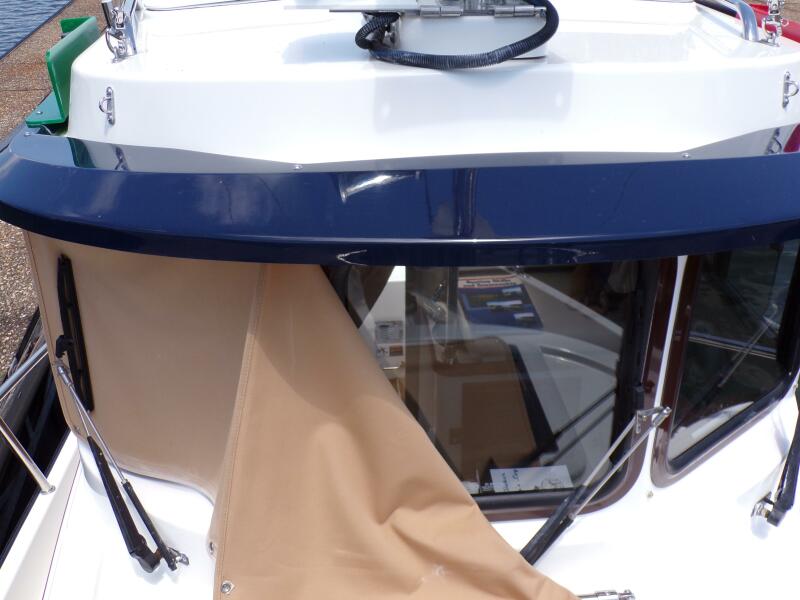 Miss Baker 2017 Ranger Tugs R-21EC window covering