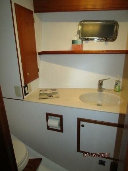 56' DeFever mid guest stateroom head