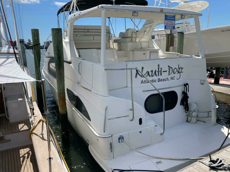 NAUTI  DOGZ 43ft Silverton Yacht For Sale