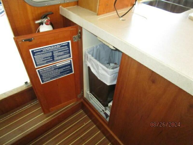 40' Mainship galley trash compartment