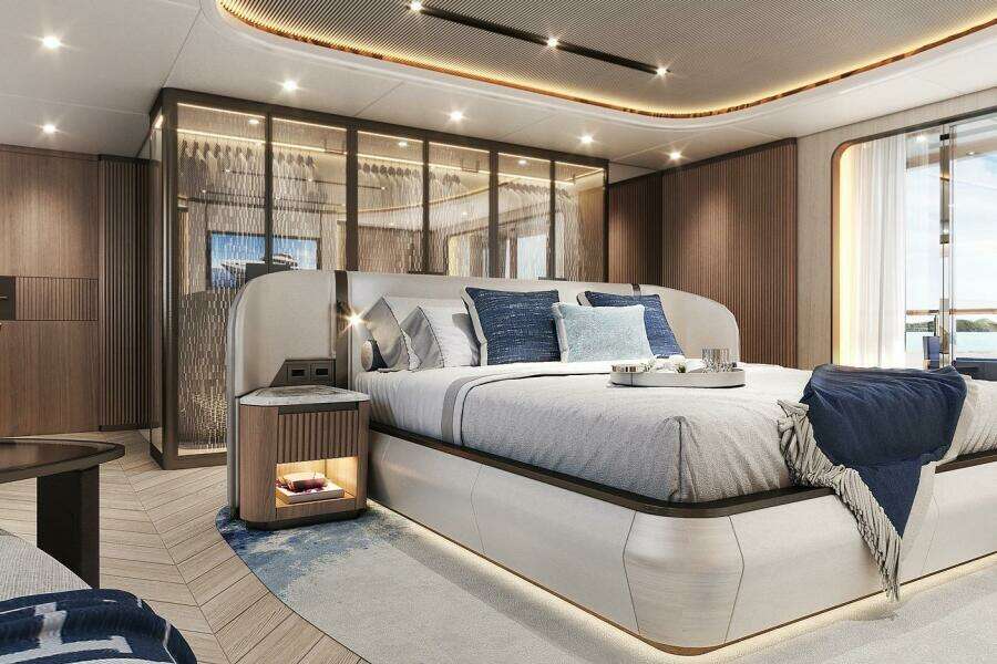 Luxurious bedroom interior on 2026 Majesty 145 yacht, featuring elegant design and modern amenities.