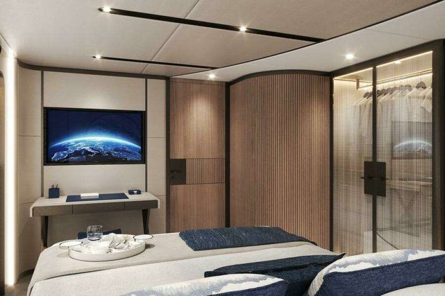 Luxurious 2026 Majesty 145 yacht bedroom with modern decor, TV, and elegant lighting.