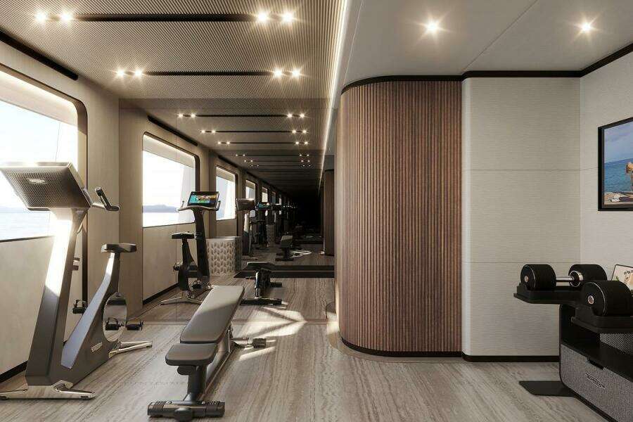 Luxurious gym interior on 2026 Majesty 145 yacht, featuring modern fitness equipment and elegant design.