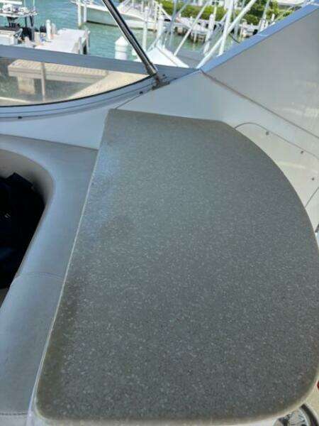 2006 Carver 43 Motor Yacht interior detail with a sleek countertop and marina view.
