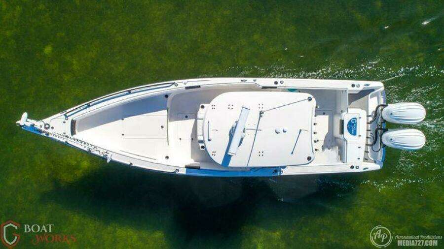 Aerial view of 2022 CG Boat Works 35 M-Series on clear water.