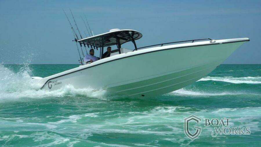 2022 CG Boat Works 35 M-Series cruising on turquoise waters.