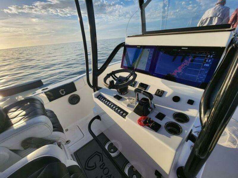 2022 CG Boat Works 35 M-Series cockpit with modern navigation system at sea.