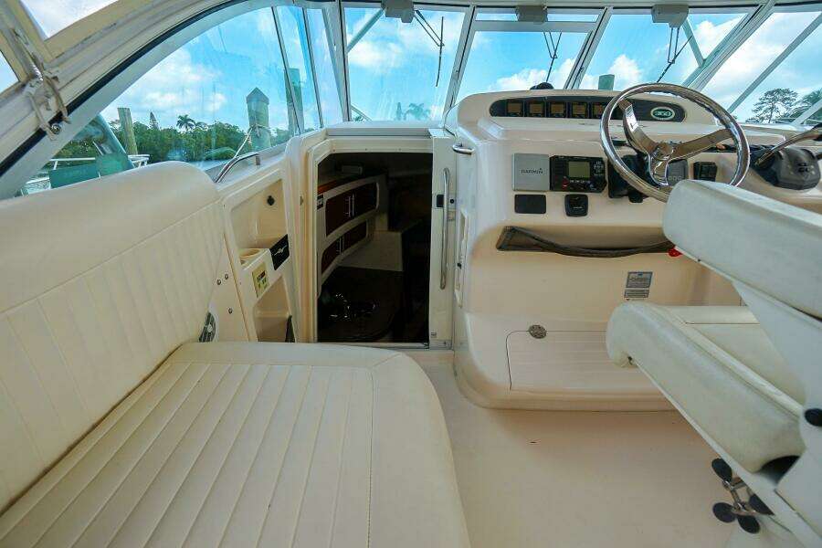 2007 Grady-White Express 360 boat interior with helm and seating area.