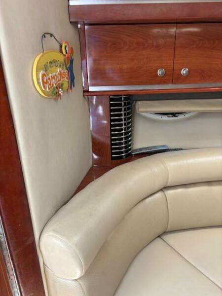 2007 Monterey 350 Sport Yacht kitchen with wood cabinets and granite countertop.