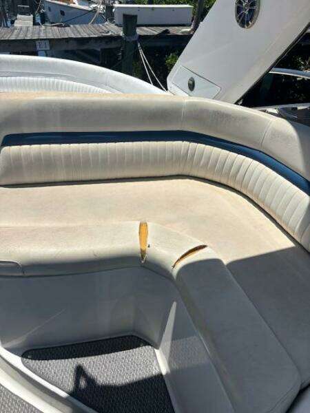 2007 Monterey 350 Sport Yacht interior with cushioned seating and carpeted flooring.
