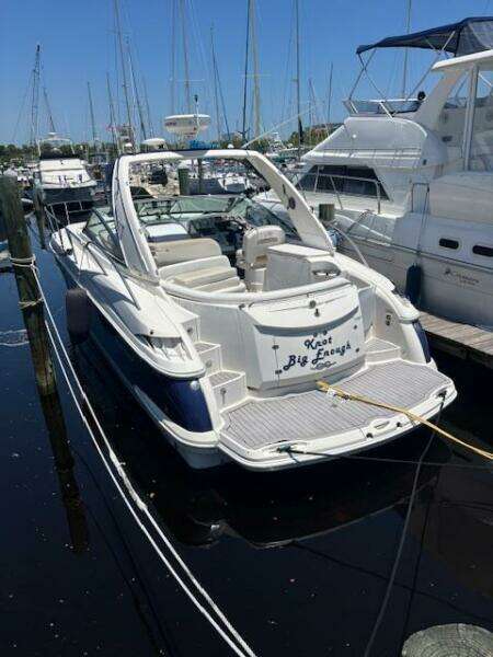 2007 Monterey 350 Sport Yacht docked at marina, sunny day, rear view.