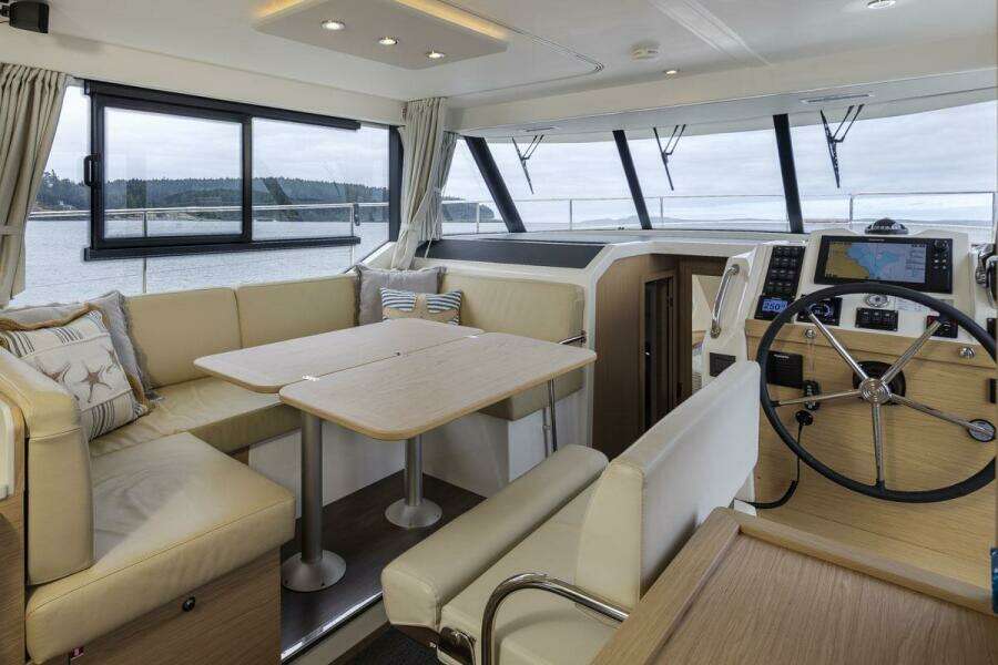Main salon seating with spinning helm chair