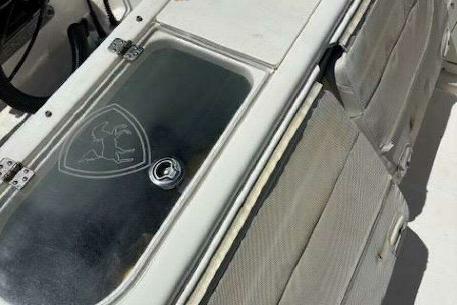 2018 Century 2600 Center Console boat interior with storage compartment.