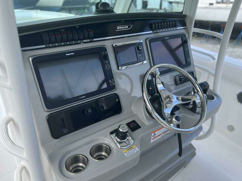 2014 Boston Whaler 350 Outrage Helm from port with electronics uncovered