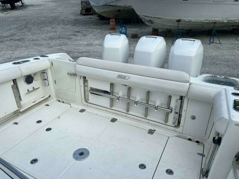2014 Boston Whaler 350 Outrage cockpit with rear bench seat closed, looking from port side