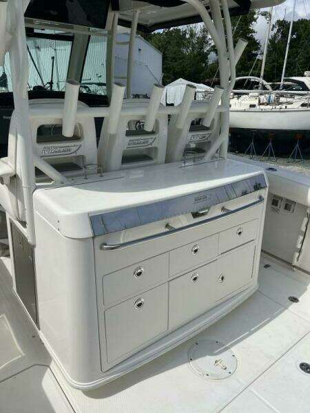 2014 Boston Whaler 350 Outrage Summer Kitchen Leaning Post closed, looking from port side