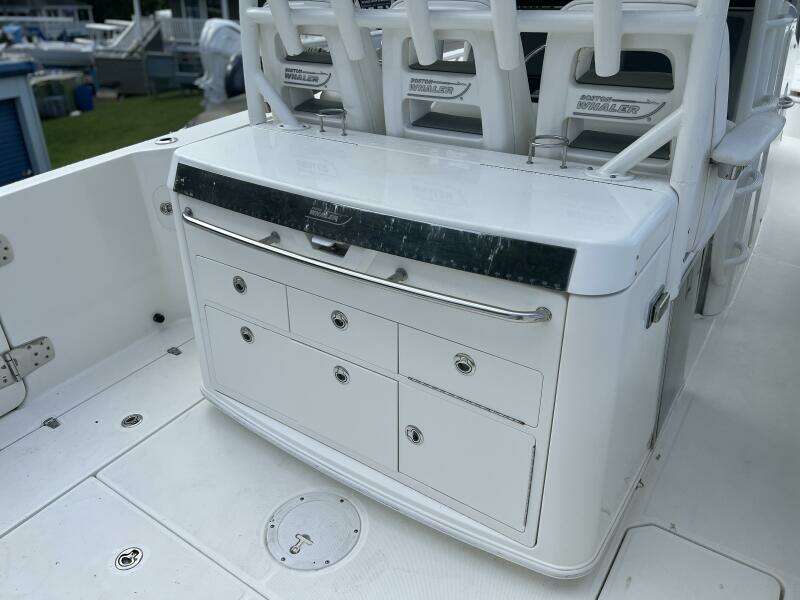 2014 Boston Whaler 350 Outrage Summer Kitchen Leaning Post closed, looking from starboard side