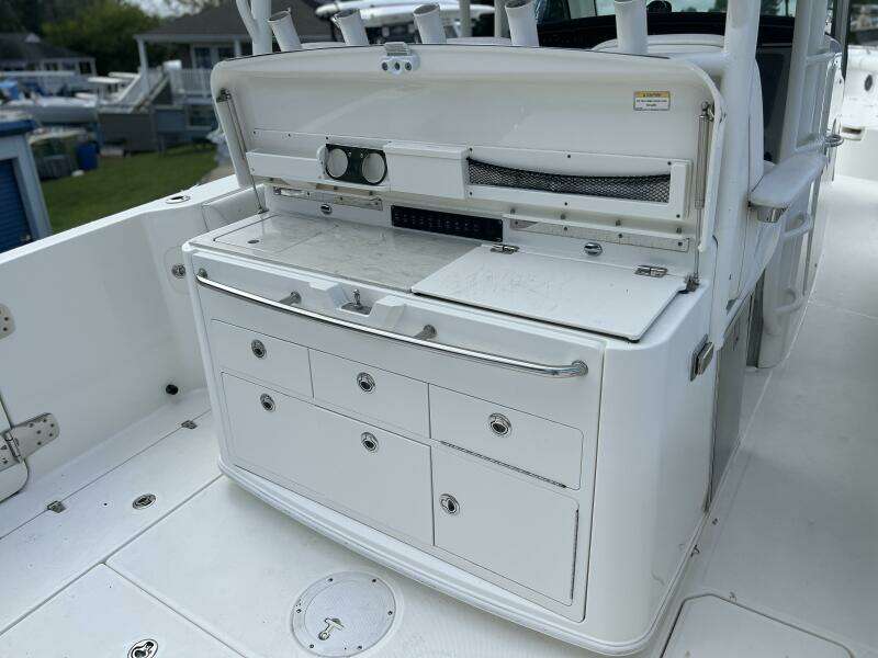 2014 Boston Whaler 350 Outrage Summer Kitchen Leaning Post open, looking from starboard side