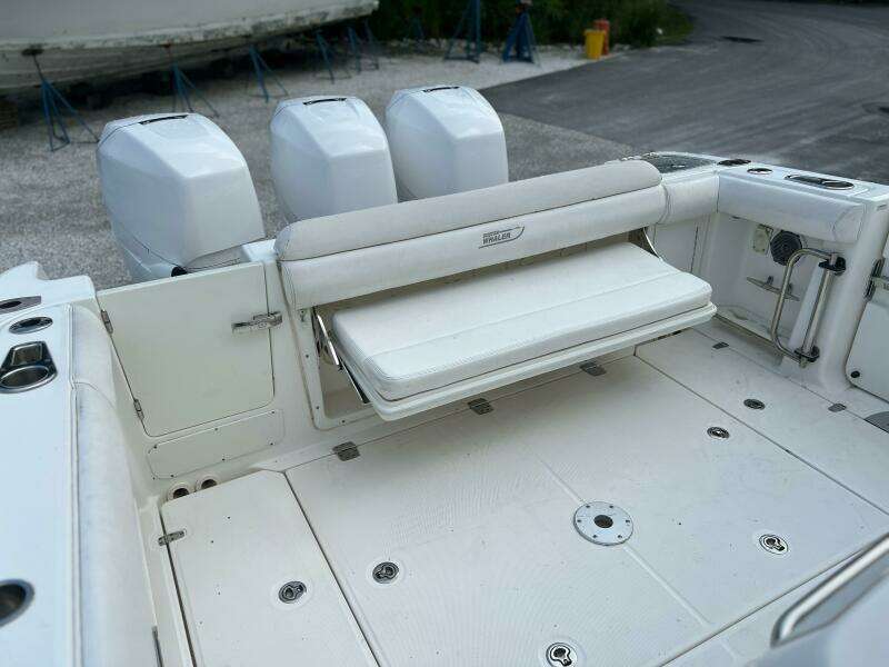 2014 Boston Whaler 350 Outrage cockpit with rear bench seat open, looking from starboard side
