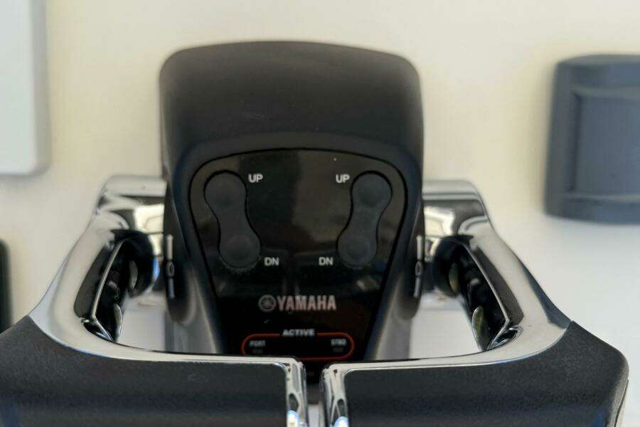 Close-up of Yamaha throttle controls on a 2015 Cobia 296 Center Console boat.