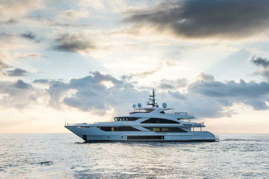 Luxury Majesty 140 yacht sailing at sunset, 2020 model.