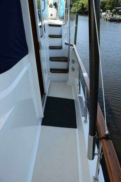 Portside deck and stairs to flybridge