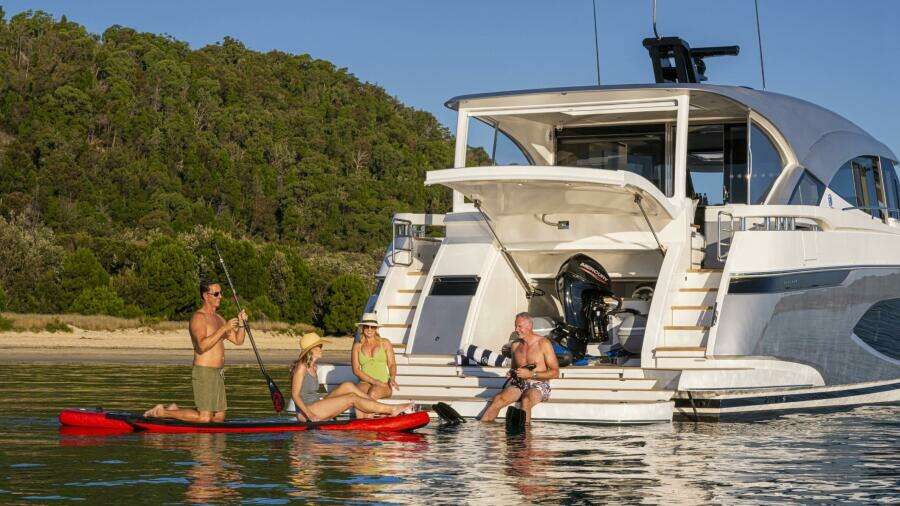 Riviera 6800 Sport Yacht PE Watersports Garage 01 Scaled