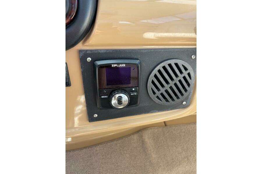 Control panel on 2004 Carver 466 Motor Yacht with Zipwake system and speaker grille. Control panel on 2004 Carver 466 Motor Yacht with Zipwake system and speaker grille.