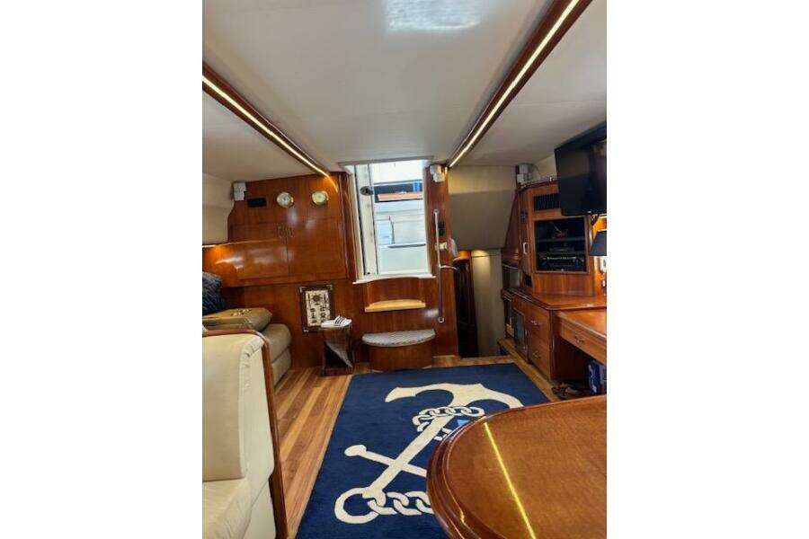 Interior of 2004 Carver 466 Motor Yacht with wood finish and nautical decor. Interior of 2004 Carver 466 Motor Yacht with wood finish and nautical decor.