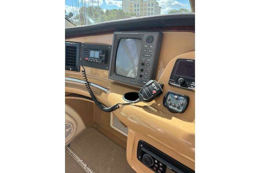Control panel of 2004 Carver 466 Motor Yacht with navigation equipment and radio. Control panel of 2004 Carver 466 Motor Yacht with navigation equipment and radio.