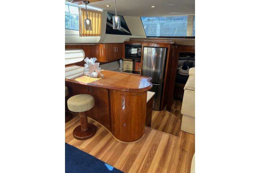 Luxurious interior of 2004 Carver 466 Motor Yacht with elegant wood finishes. Luxurious interior of 2004 Carver 466 Motor Yacht with elegant wood finishes.