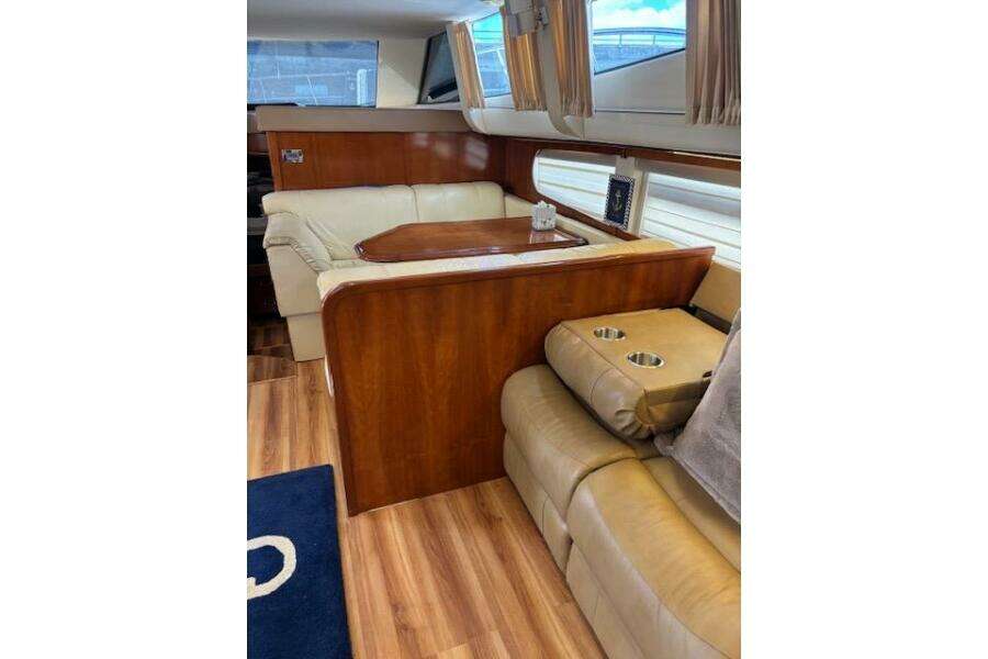 Luxurious interior of 2004 Carver 466 Motor Yacht with leather seating and wood accents. Luxurious interior of 2004 Carver 466 Motor Yacht with leather seating and wood accents.