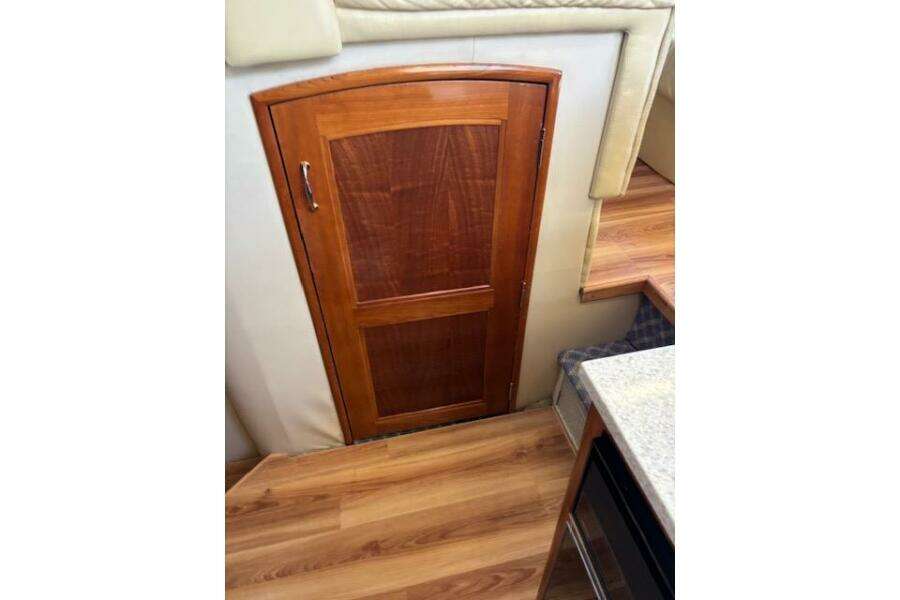 Wooden door inside 2004 Carver 466 Motor Yacht, featuring elegant interior design. Wooden door inside 2004 Carver 466 Motor Yacht, featuring elegant interior design.