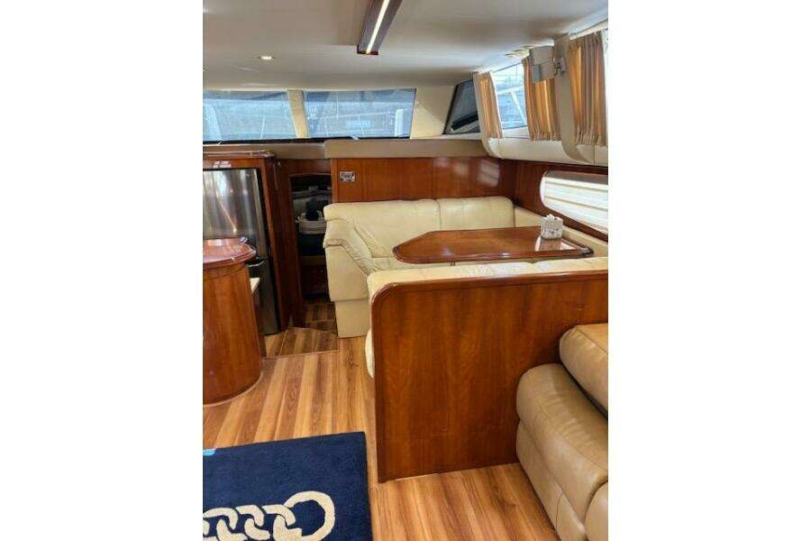 Interior of 2004 Carver 466 Motor Yacht with elegant wood and leather furnishings. Interior of 2004 Carver 466 Motor Yacht with elegant wood and leather furnishings.
