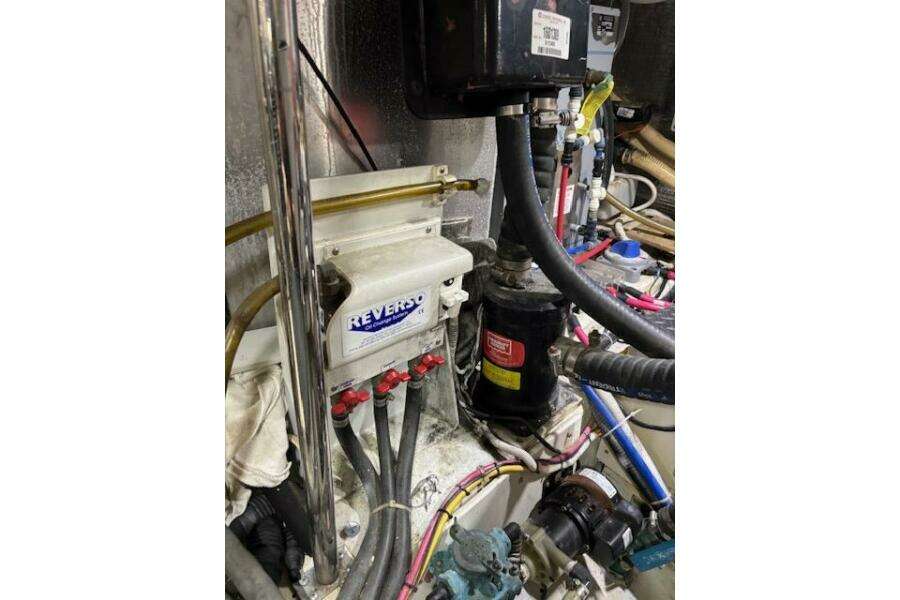 Engine room of 2004 Carver 466 Motor Yacht with Reverso oil change system. Engine room of 2004 Carver 466 Motor Yacht with Reverso oil change system.