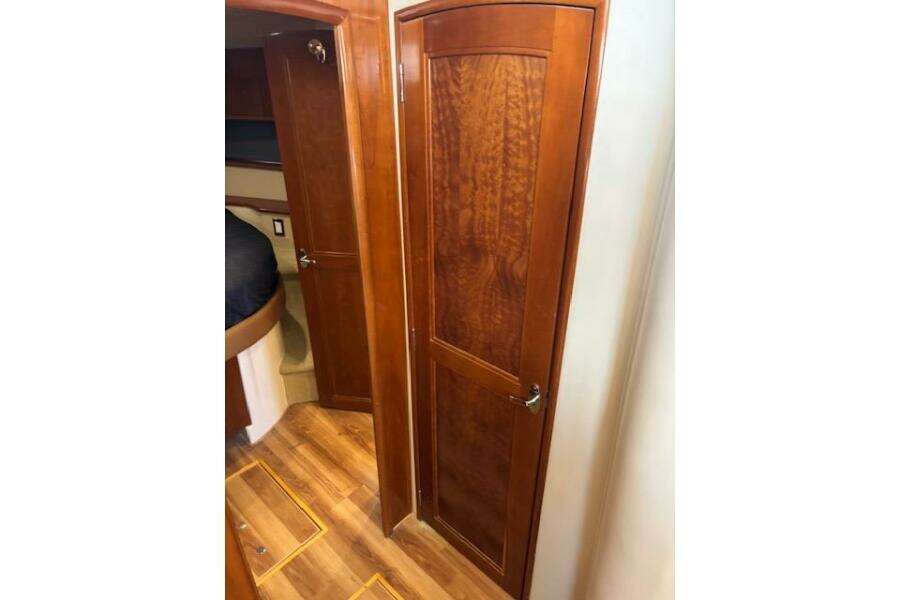 Interior of 2004 Carver 466 Motor Yacht with wooden doors and flooring. Interior of 2004 Carver 466 Motor Yacht with wooden doors and flooring.